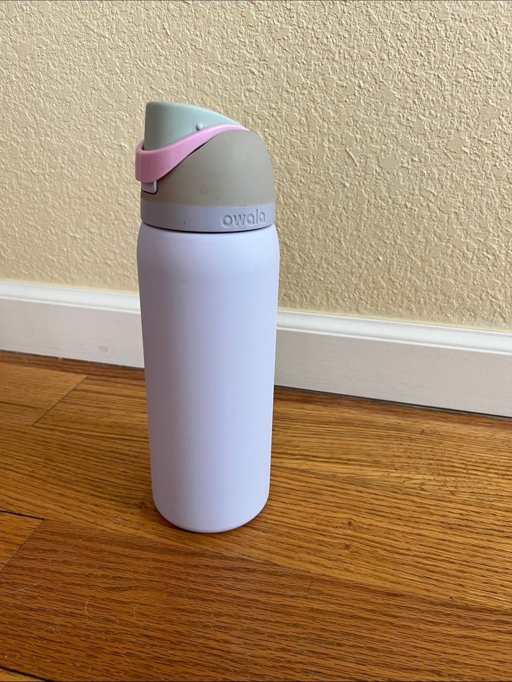 Owala White Stainless Water Bottle with Pink Accent